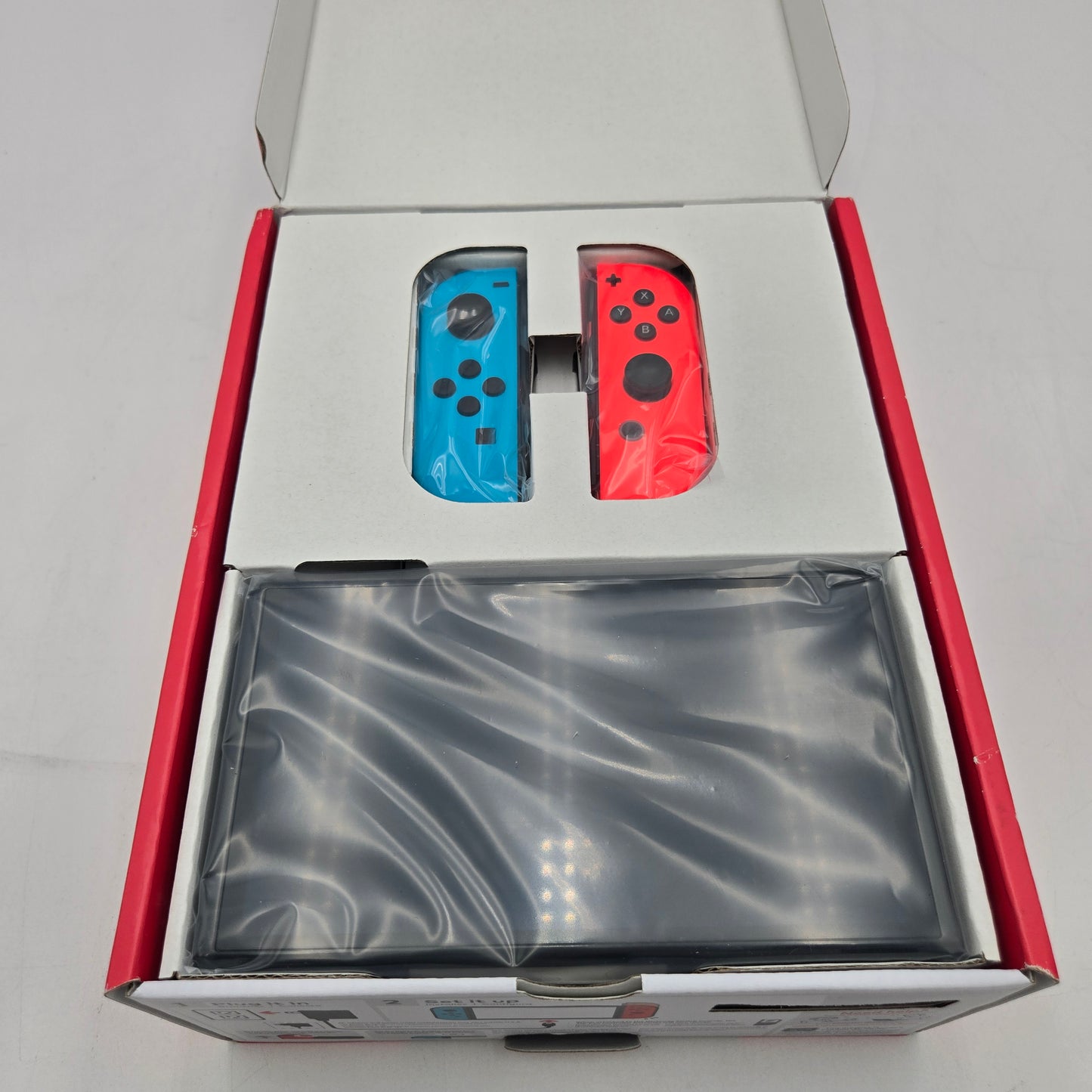Like Brand New Nintendo Switch OLED Video Game Console HEG-001 Red/Blue