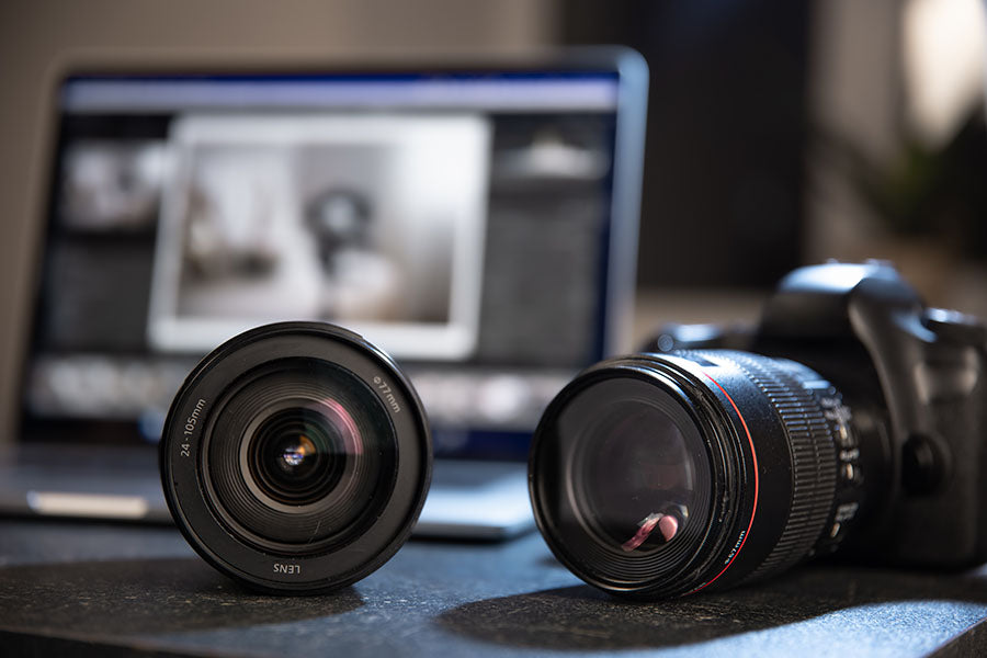 Camera lenses displayed for resale at PayMore Wake Forest